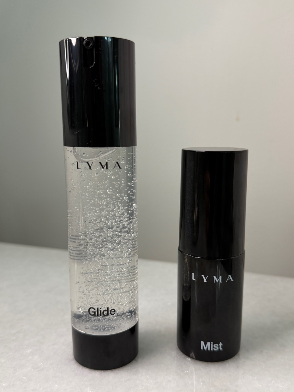 Lyma Laser Glide & Mist Hydrating Duo – Clear & Black